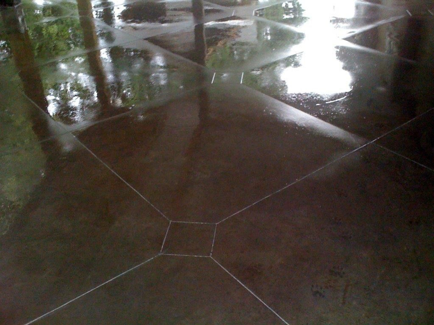 Acid-stained concrete floor finish