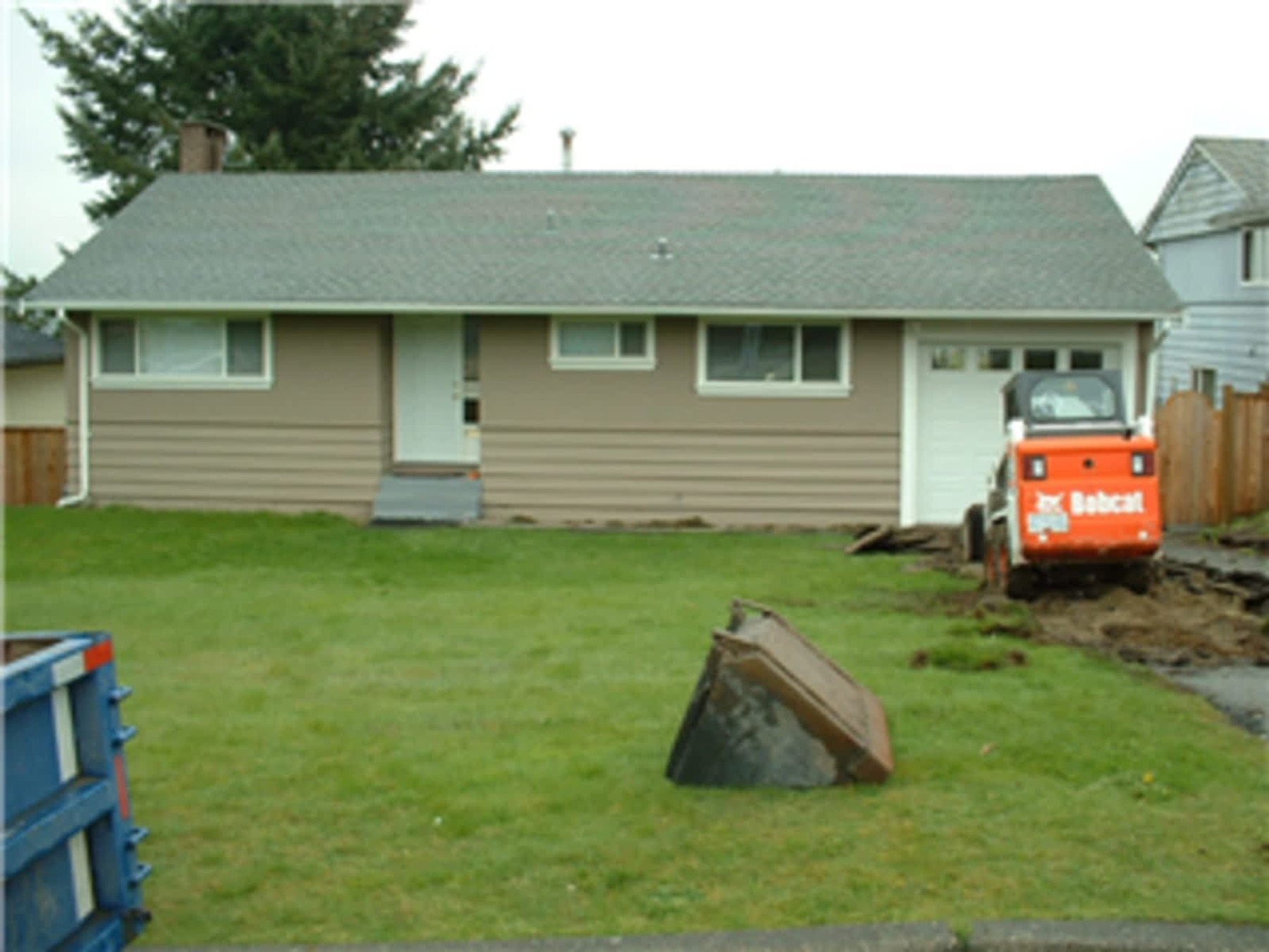 Bobcat excavation equipment at a residential property