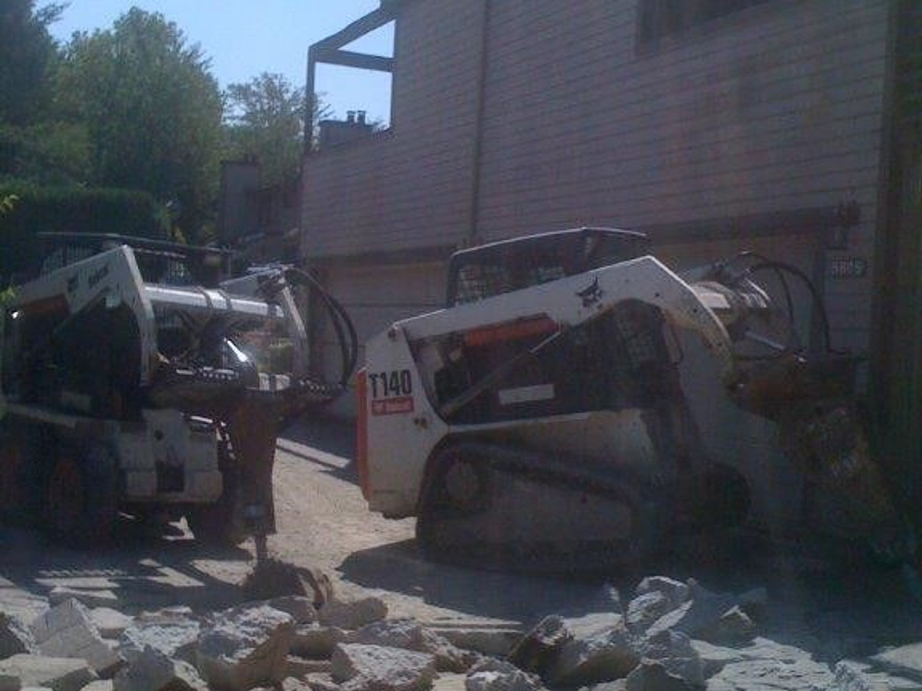 Excavation and demolition equipment on a commercial job site